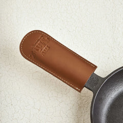 myMayz Cast Iron Set: 2 Skillets with 2 Leather Handle Covers